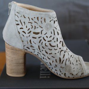 Gray suede booties with lace cutout design